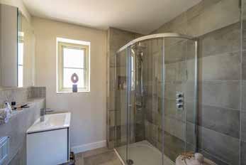 and En Suite shower Room with waterfall shower. 4 further Bedrooms and 3 further Bath/Shower Rooms (2 En Suite).