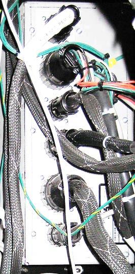 Unplug Shell Harness Cable from P5 Connector Figure 7-3: Removing Shell Harness Cable from P5 Conn. on C-More Rear Panel 3.