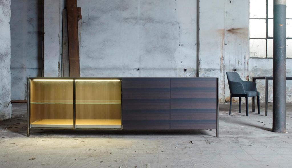 Strand Rodolfo Dordoni Strand, a series of elegantly outlined sideboard where cutting-edge technological solutions meet with a careful use of different materials.