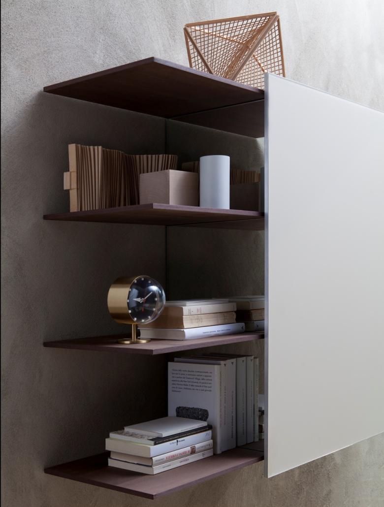 Pass-Word Suspended wall unit with sliding panel Suspended wall unit with overhanging shelves made of aluminium sheets.