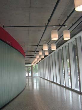 quartz halogen lamps). The luminaires are arranged in a radiating pattern throughout the circular room. There are a total of 31 of these fixtures installed in the room.