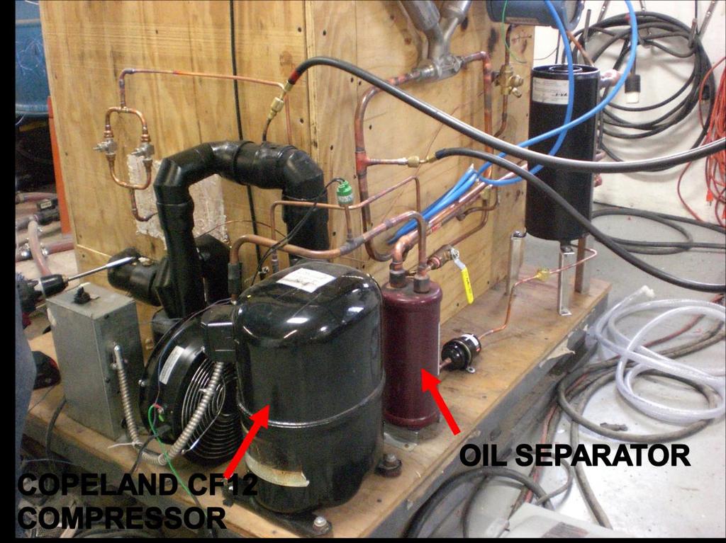 48 Figure 5.3: Copeland CF12 (Emerson, 2010b) compressor and Temprite (Temprite, 2009) oil separator.
