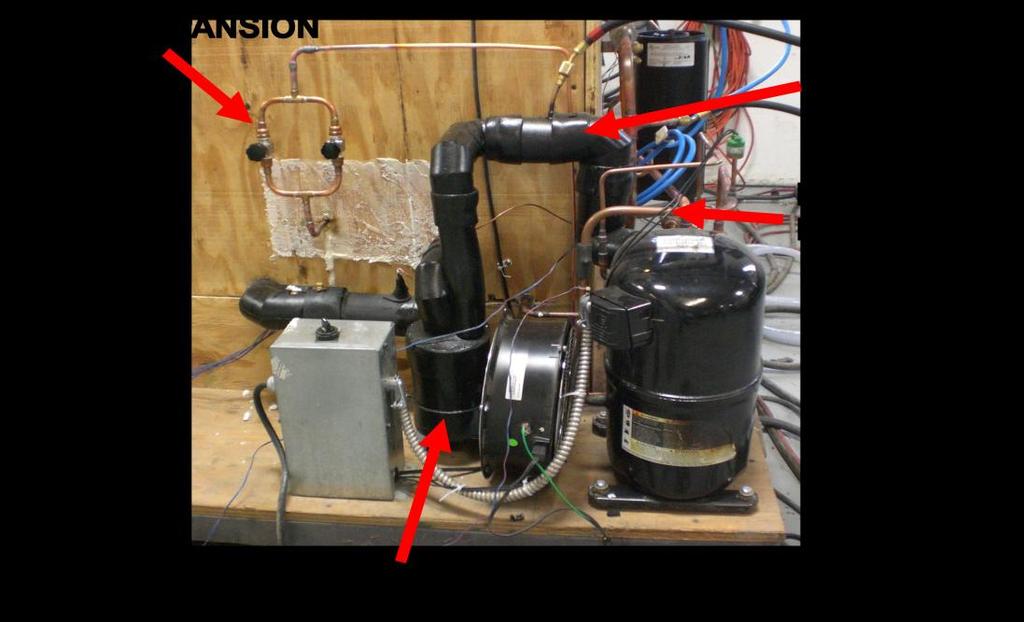 52 Figure 5.7: R134a expansion valves, suction accumulator and compressor suction line.