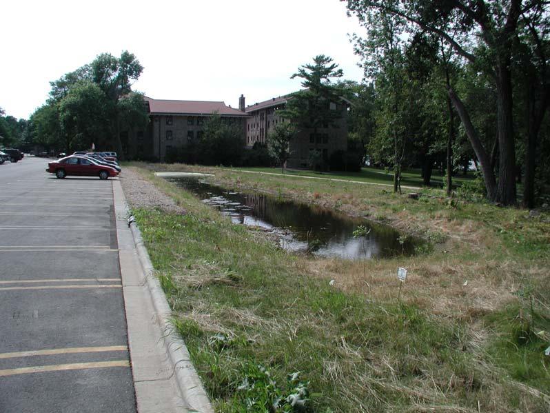Lot 34 Detention Basin ~ 7900 SF area Accepts runoff from parking lot Settling pond / detention basin & bioswale Slows water flowing overland