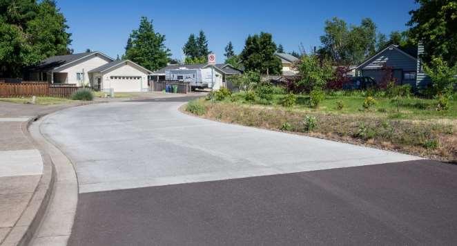 Pervious Concrete Pavement Changing gutter grade and flow pattern flow into the pavement with reverse curb and