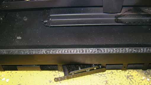 The removable battery tray is located in the lower left corner of the appliance next to the lower glass clip. Remove batteries from tray before sliding tray back into appliance. See Figure 2.3.