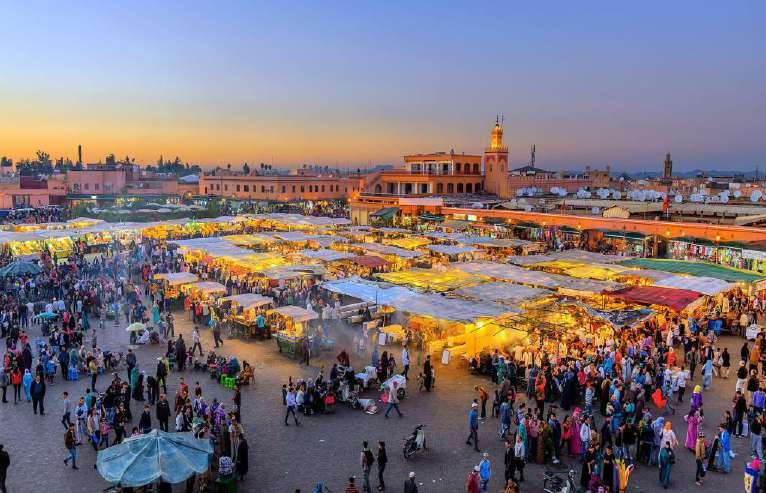 MARRAKESH : Marrakesh the legendary; Marrakesh the imperial At the foot of the High Atlas mountains lies a beautiful city, built in red and surrounded by