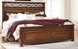 B529 Lazzene (Signature Design) Traditional bedroom made with pine solids and birch veneers in a rich light brown cherry color finish Features fluted pilasters and cast resin ornamental scroll work