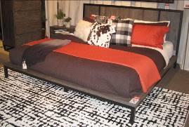 B579 Cazentine (Signature Design) Contemporary group made with reclaimed pine solids in a rustic dark gray finish that highlights the weathered industrial material A true platform bed is the