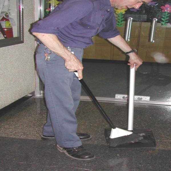 Sweep floors (Duty 1, Task 1) Figure 3: Push Broom Figure 4: Broom and Dust Pan The BSW 1 (Residential) walks from the janitor room that is closest to their assigned cleaning area.