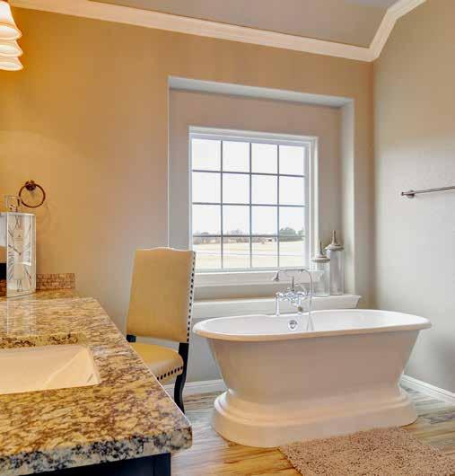 tile allowance for tub area Corner tile shelves / tiled shower ceiling MASTER ALSO INCLUDES Travertine flooring Travertine shower and tub surround