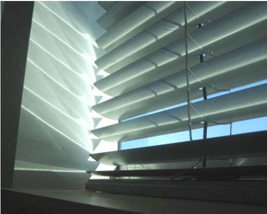 LIGHTING CONTROLS Advanced reflective blinds bounce sunlight up to the ceiling.