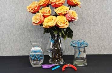 Then insert the second set of flowers between the first group of flowers in a centerpiece or one-sided display as shown here. Continue until all flowers are used or you are satisfied with the design.