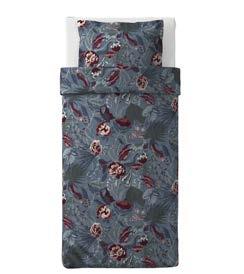 Designer: Malin Gyllensvaan. Dark blue/floral patterned 104.125.