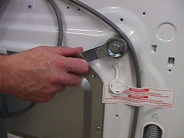SHIPPING BOLTS The shipping bolts MUST BE REMOVED before operating the washer. Use the wrench supplied or a socket wrench for speed.