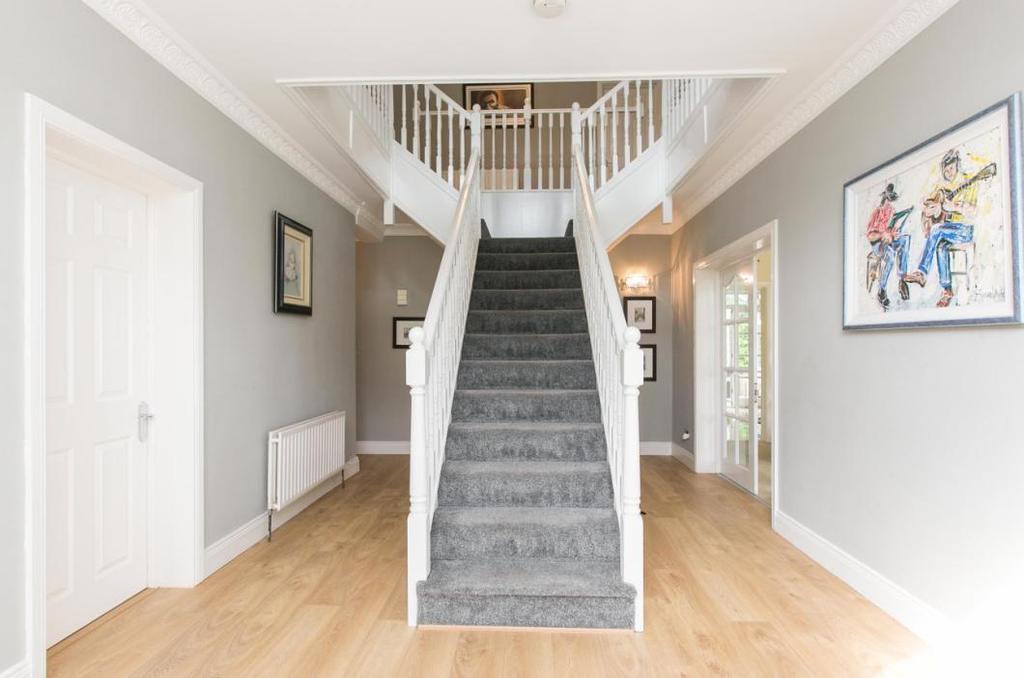 location offering excellent commuter access Gas fired central heating, double glazed windows and downstairs WC First floor study with feature glass wall Detached garage and brick paviour driveway