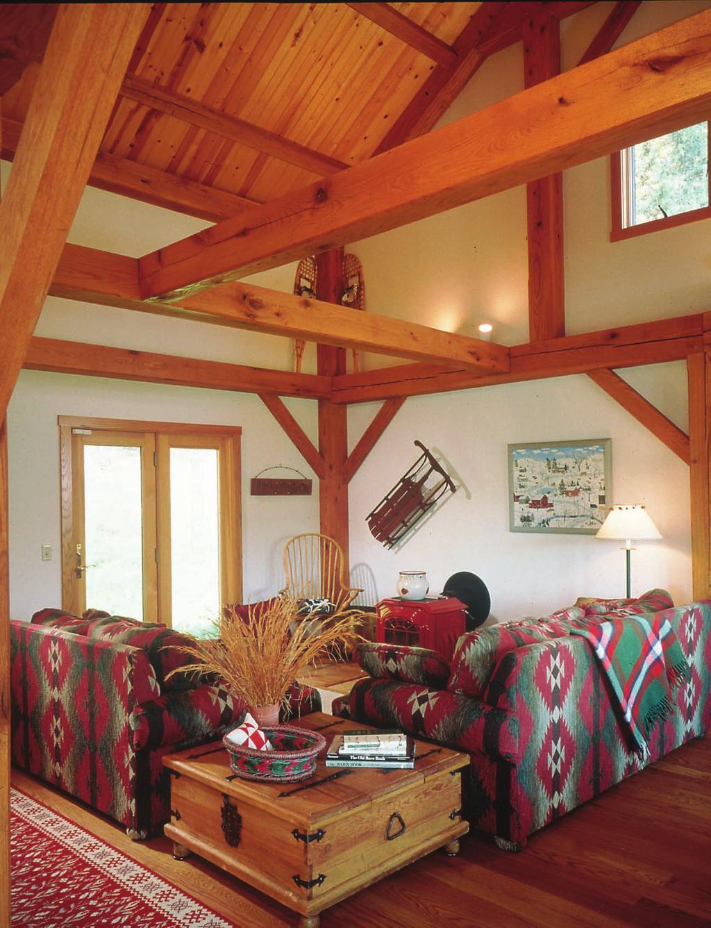 The great room showcases the beauty of the timber frame.