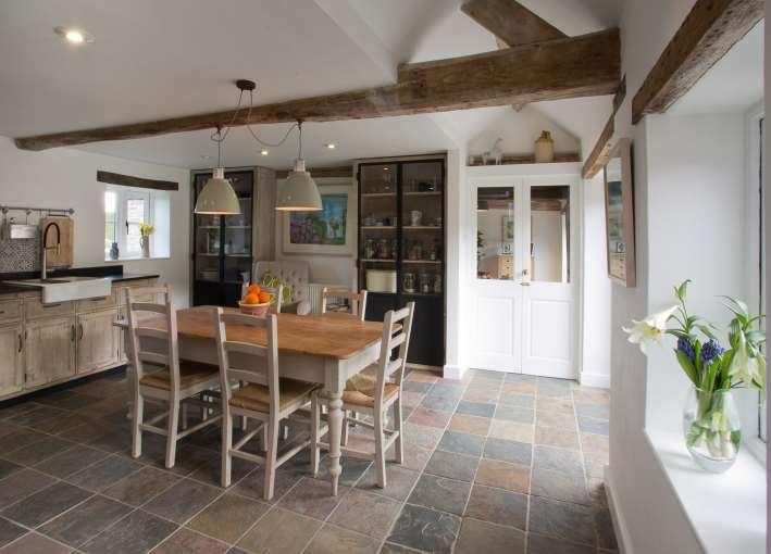 The House Tynemead Barn is situated in a rural position in the heart of this popular village of Witham Friary.