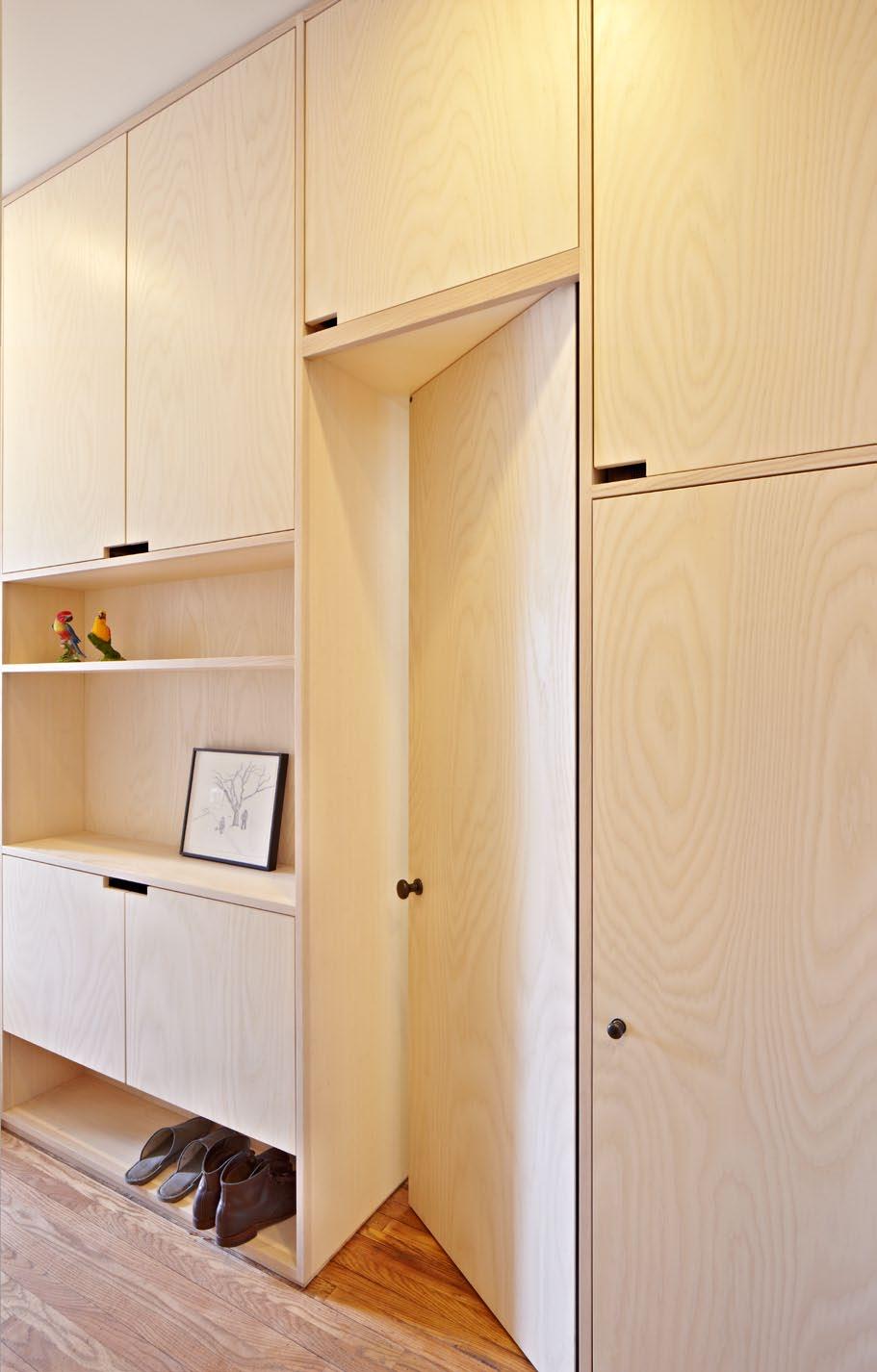A discreet cabinet door opens to provide access to a full