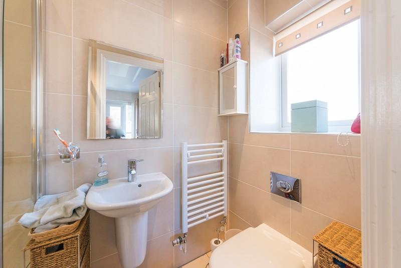 75m) Double glazed obscured and panelled door to outside stainless steel sink unit with mixer tap with a cupboard under, plumbing for automatic washing machine, wood block effect work surfaces,