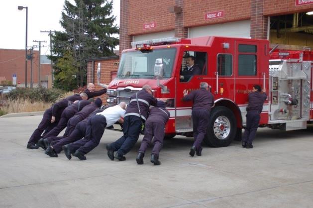 Harding, blessed the LFD s new Engine 45 before it was pushed