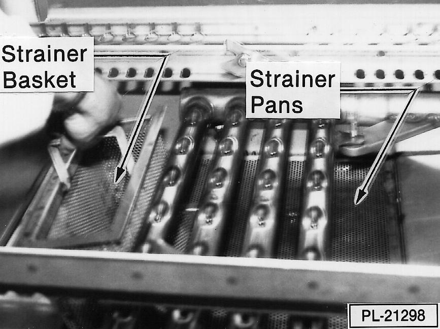 Remove the strainer basket and strainer pans from the wash chamber (Fig. 3). Place the pump intake strainer on the three hooks as shown in Fig. 4. Place the overflow tube in the retainer (Fig. 5).