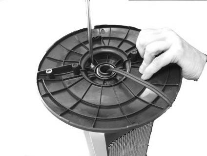 Move base so the screw holes align properly. Using the 4 base screws provided (taped to the Tower Heater), secure the base to the bottom of the Tower Heater. (Fig. 2) 6.