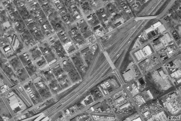 Figure 2. Example of 1 m monochromatic aerial photograph (USGS photo) Location: The block number range and the street name are noted. A sub-area name could also be used to describe the drainage area.
