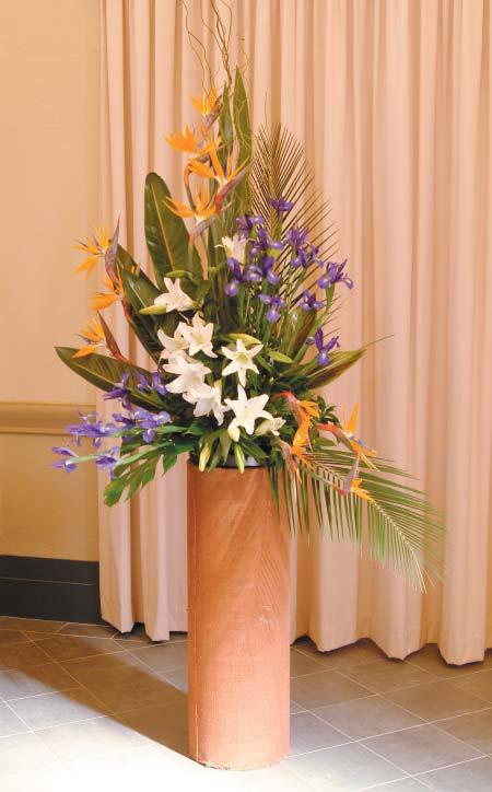 of paradise, casa blanca lilies, blue Iris and lush foliages $660