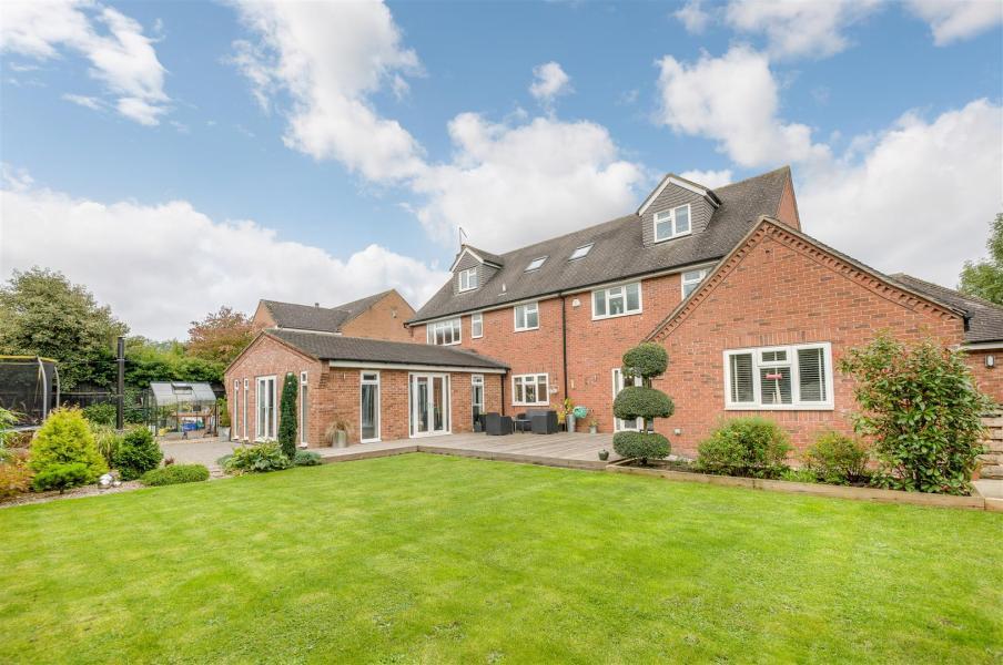 Having been updated and extended to an excellent standard by the present owners, the property boasts from four reception rooms, that include a 23ft long "games room"