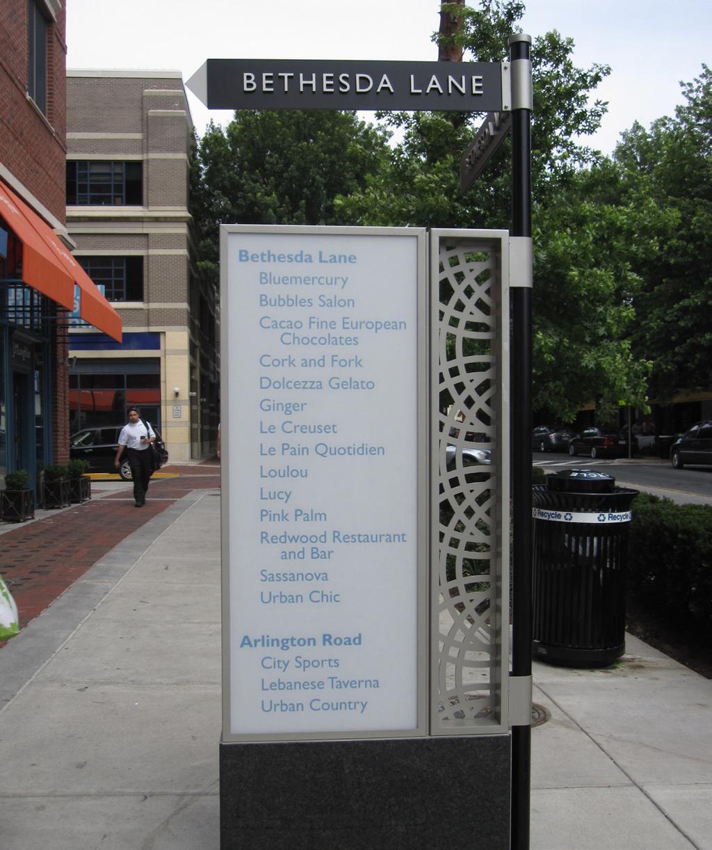 ADDITIONAL PLACEMAKING ELEMENTS 6A SIGNAGE AND WAYFINDING IN THE PUBLIC REALM LEFT Distinctive street and wayfinding sign with stores listed by location Image Credit: Fairfax County Wayfinding