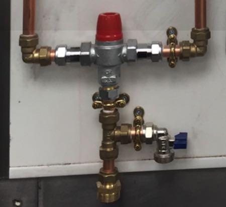 A dedicated warm water source with a 3/4 inch male pipe fitting is also required within 6 feet (2 meters) of the left side of the machine. Incoming water pressure should be a minimum of 50 PSI (3.