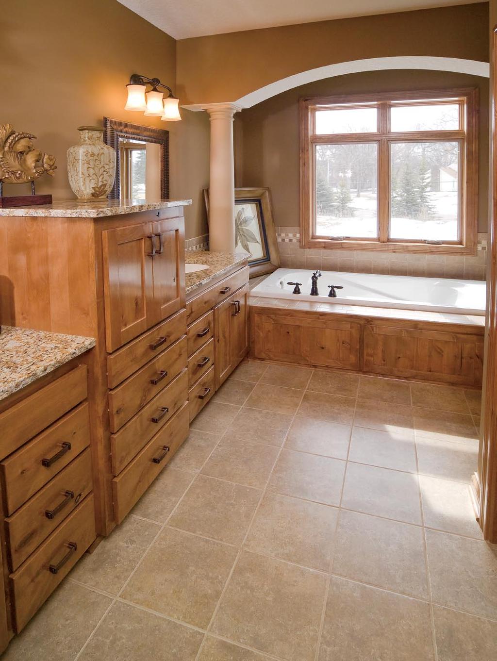 This well-designed master bath boasts luxury features in an effectively planned space.