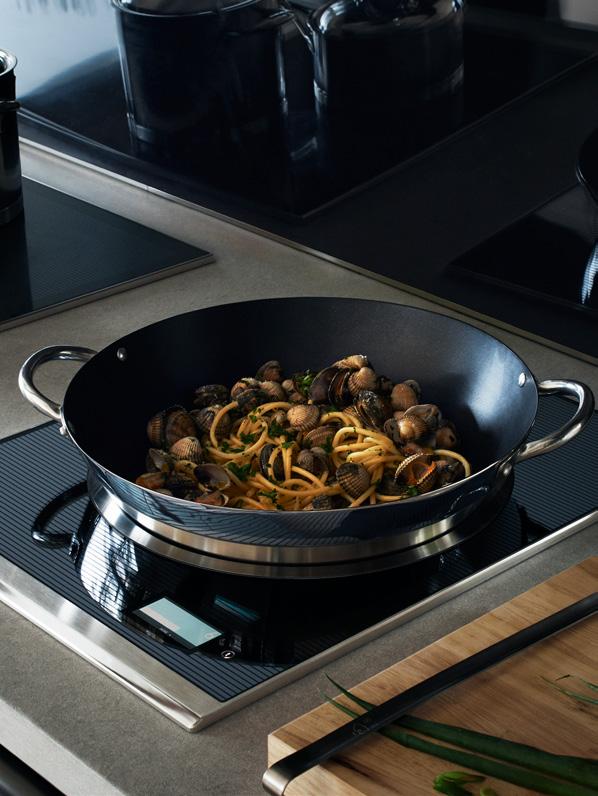 t h e s y s t e m 5 9 the surround induction zone The advantages of induction cooking include energy efficiency, power and precision, with less overall heat generated within the kitchen.