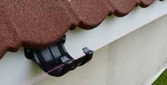 4 STEP 4 Insert the gutter into the gutter outlet - level with