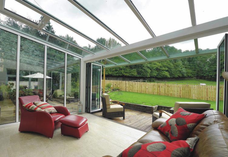 veranda glass extension The glazing bars in the roof oversail and carry the glass with it, to form a cocoon