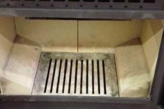 Cover the grate with crumpled pieces of paper and lay 10-12 pieces of kindling on top of the paper towards the back of the firebox. 4. lgnite and close the fire door. 5.