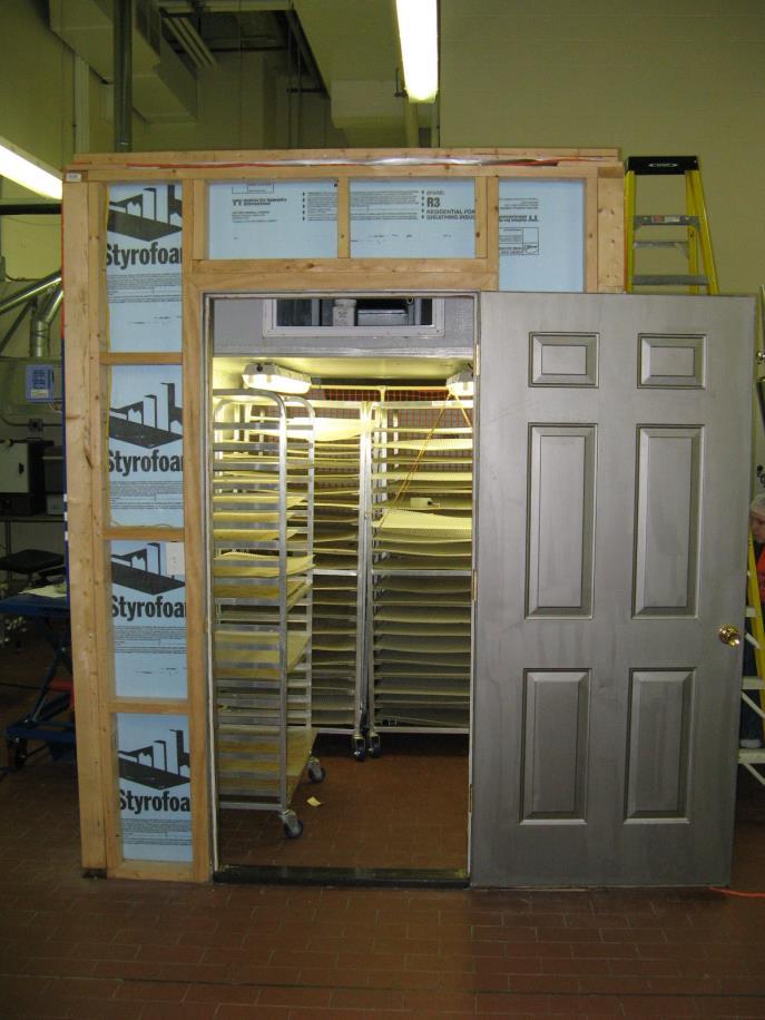 Jerky Dehydrator Insulated wood frame room Designed to dehydrate thin beef strips into beef jerky.