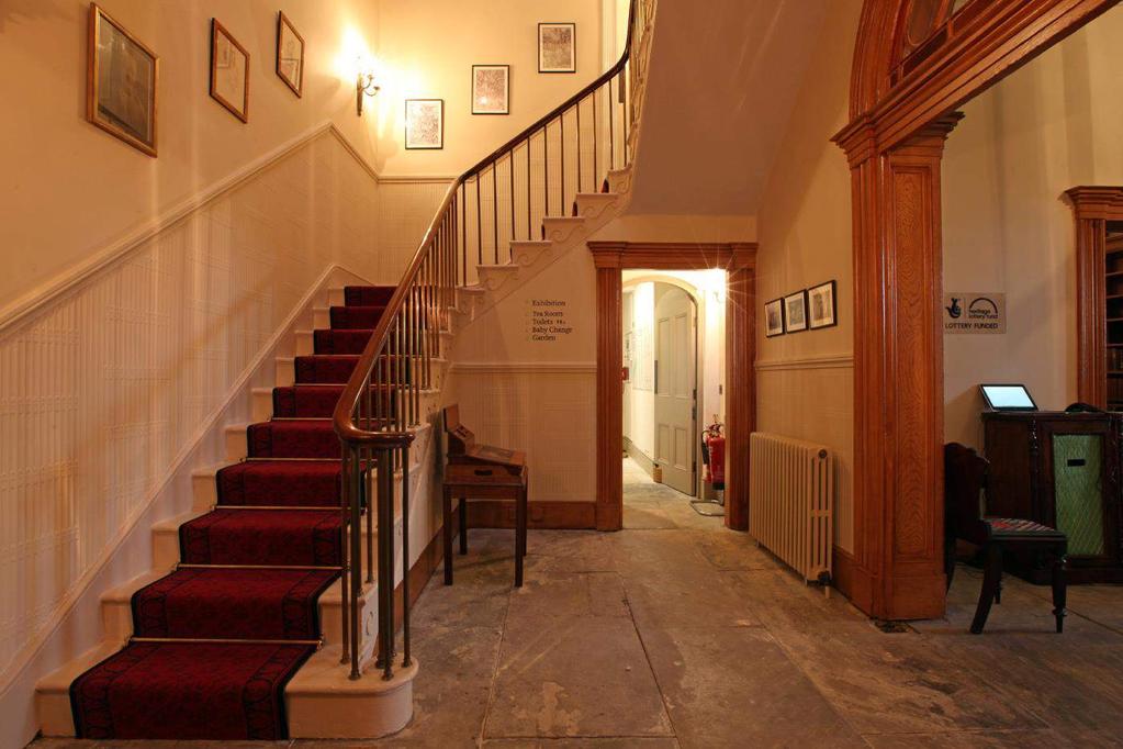 The Inner Hall & Staircase with Lincrusta (invented 1877) applied below a dado rail.