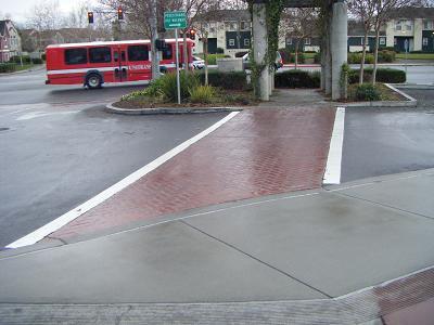 C.G.21: Paving Treatments: Sidewalks with special paving treatments such as pavers or stamped, colored concrete are encouraged to invite pedestrian activity. (Figs. 3 & 11) C.G.22: Transit Access: When a transit stop exists in close proximity to a new commercial building or development, provide a safe walkway from the transit stop to the place of business.