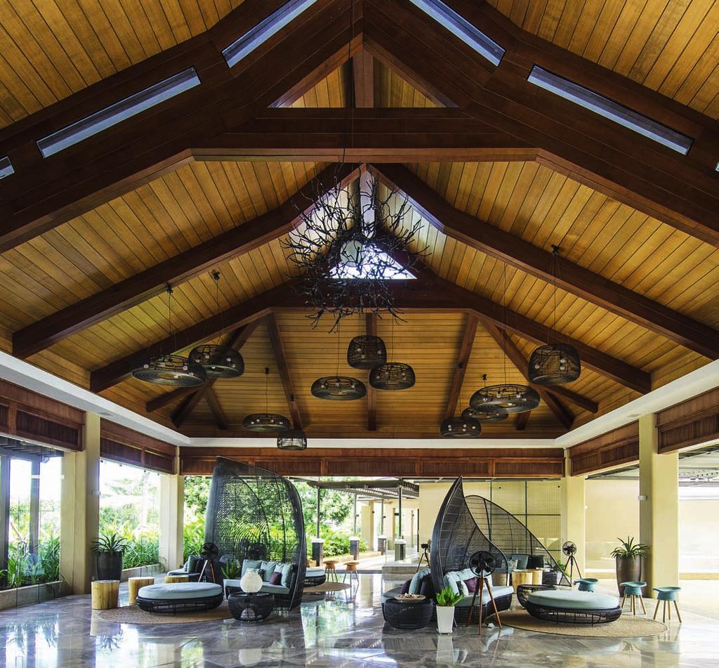 LANDSCAPE ARCHITECTURE Upon arrival, guests are greeted by an expansive lobby sporting a warm and contemporary interior with lamps and furniture pieces by Cobonpue.
