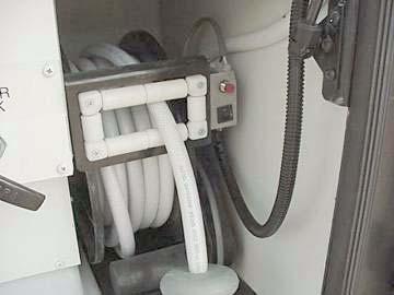 Water Hose Reel (if equipped) -Typical View 2. Turn the Fresh Water Valve to Tank Fill position.