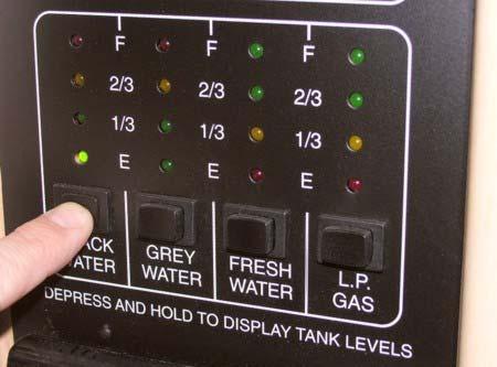 Water and Holding Tank Levels Press and Hold the appropriate button to show approximate tank level on the monitor lights.