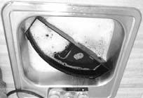 Cleaning (continued) Daily Cleaning 1. Empty drip pan as needed and wash daily in a dish detergent. 2.