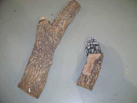 Right side of log should contact right refractory and burned portion of log