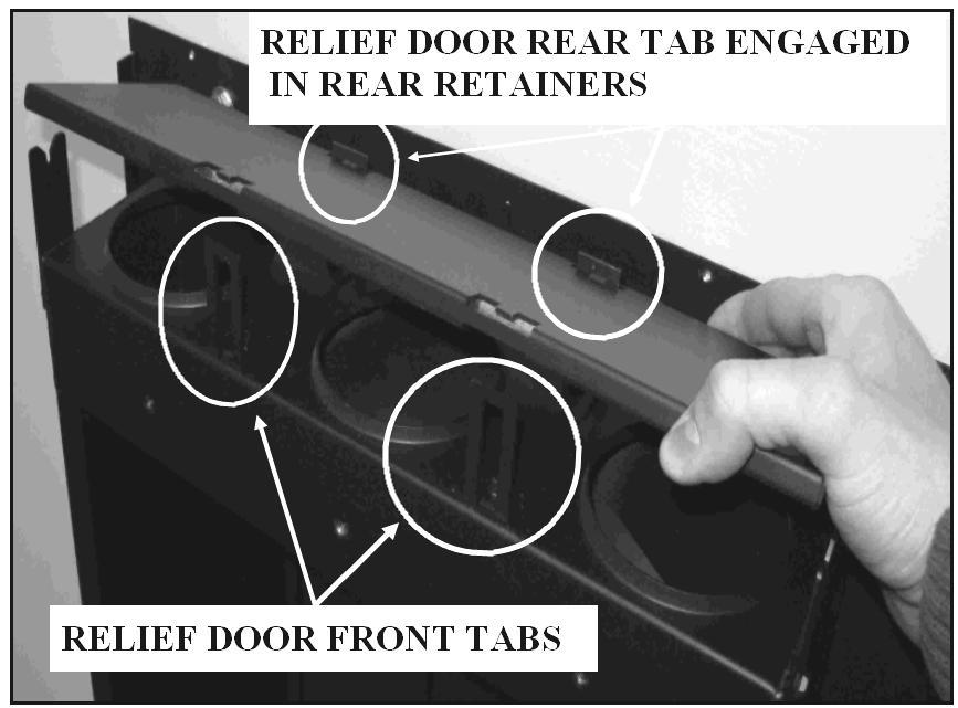 The first illustration below shows the relief openings and relief door retainers. 3. Each relief door includes line-up tabs that correspond to slotted retainers on the firebox. 4.