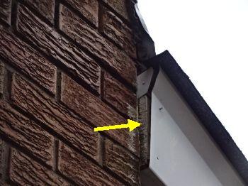 Flashing missing on the end. Exposed wood.