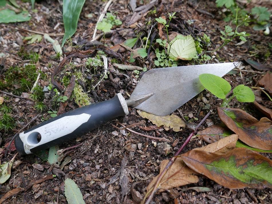 I find a builders trowel is far better than the majority of had trowels or forks for removing weeds or planting - it is much