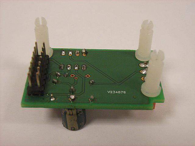 The sensor must point downwards to the middle of the drum. 3) Install the expansion board (7) on the back of the controller. The connector for this is located next to the battery holder.