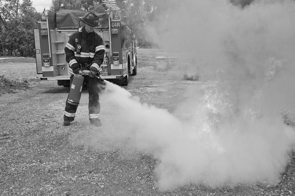 Depending on the size of the fire and fire extinguisher, you must be within 5 to 45 ft (2 to 14 m) of the fire to be effective. 3. Remove the hose and nozzle.